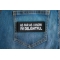 As Far As I Know I'm Delightful Patch shown on jeans