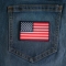 Blue Border American Flag Patch shown on jeans