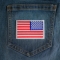 White Border Reversed American Flag Patch shown on jeans