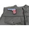 9 Mm Gun With US Flag Patch 9 Mm Gun with US Flag Patch - 4x3 inch. Embroidered Iron on Patch shown on leather vest