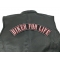  shown on leather vest