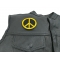 Peace Sign Patch  Yellow On Black Peace Sign Patch Yellow On Black - 3x3 inch. Embroidered Iron on Patch shown on leather vest