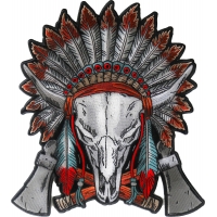 Buffalo skull wearing a head dress and feather hanging from it's horns, crossed axes at the bottom