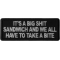 It's a Big Shit Sandwich and We all have to take a Bite Funny Iron on Patch