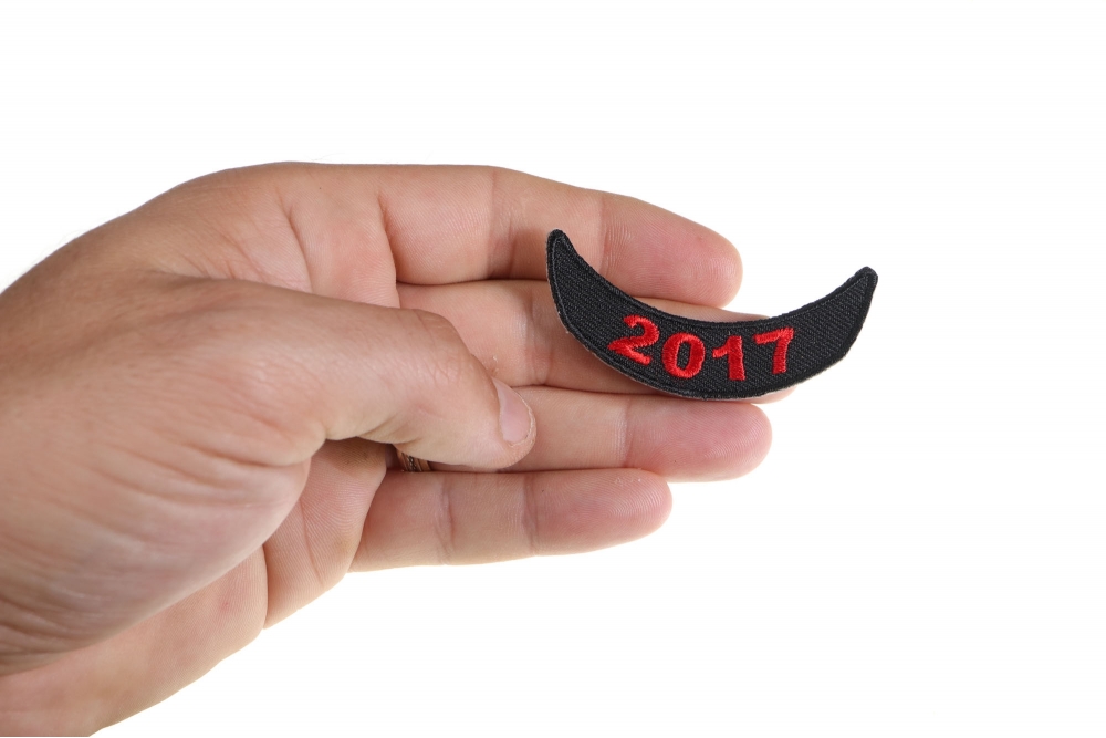  shown on hand for size comparison