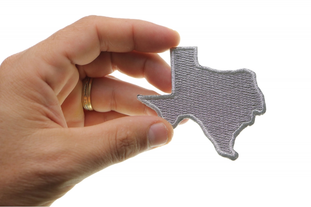  shown on hand for size comparison