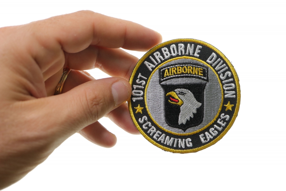 101st Airborne Division Patch Screaming Eagles shown on hand for size comparison
