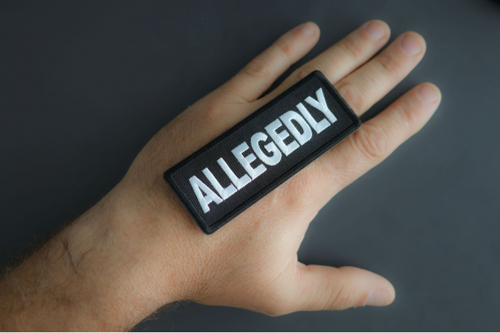 Allegedly Patch shown on hand for size comparison