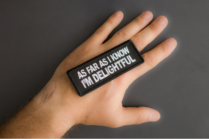 As Far As I Know I'm Delightful Patch shown on hand for size comparison