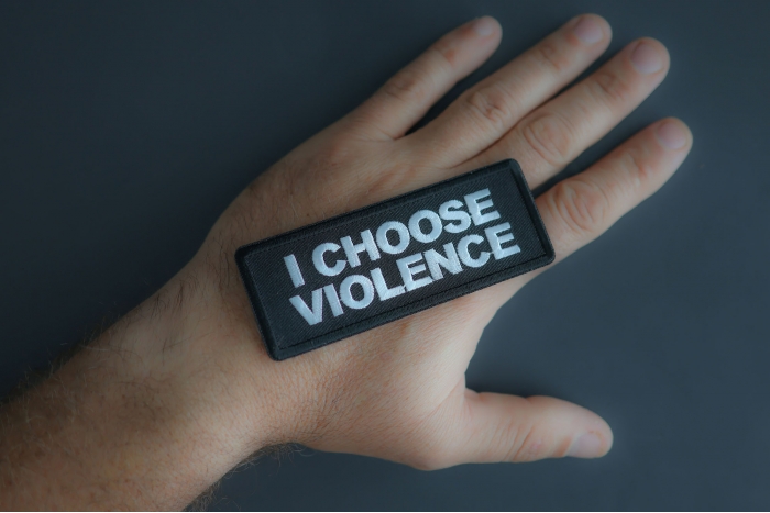 I Choose Violence Patch shown on hand for size comparison