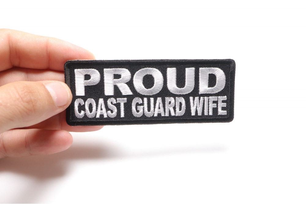 Proud Coast Guard Wife Patch shown on hand for size comparison