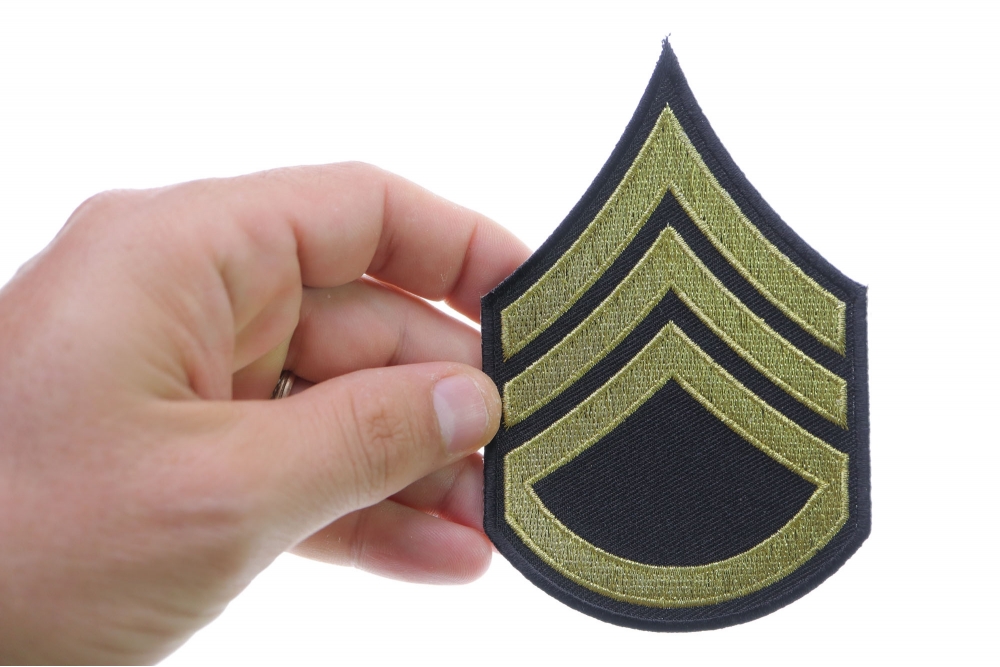 Staff Sergeant Iron on Patch shown on hand for size comparison