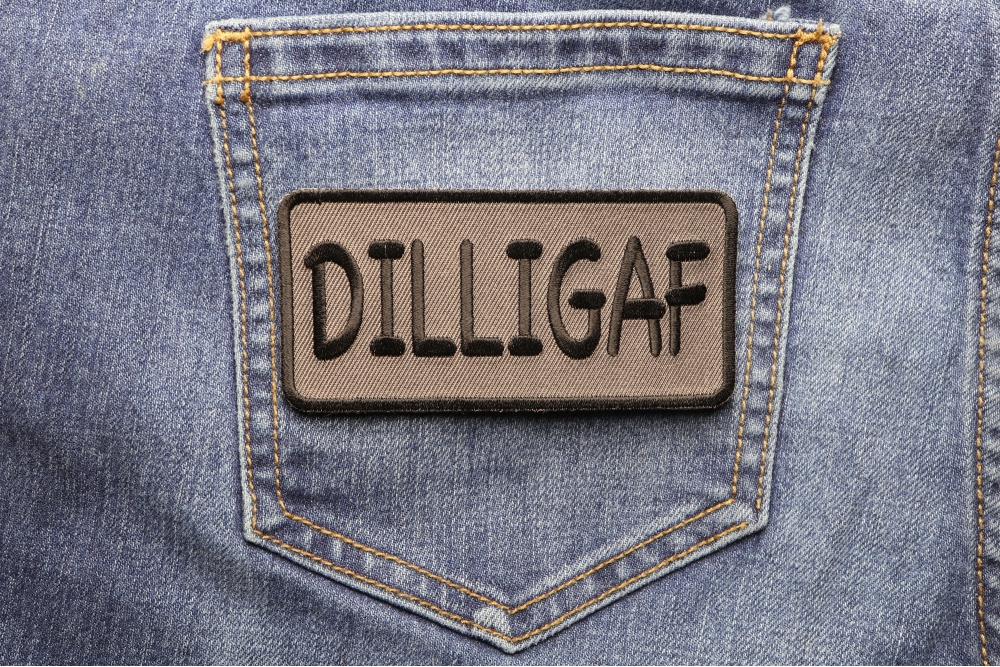 Dilligaf Patch 4 Inch Black Over Gray shown on jeans