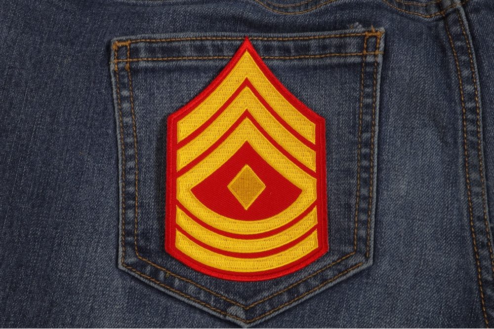 First Sergeant Red Patch shown on jeans