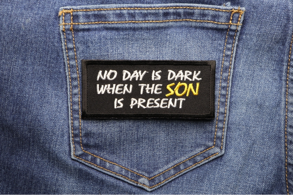 No Day Is Dark When The Son Is Present Patch shown on jeans