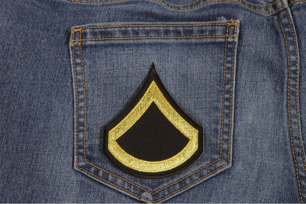 Private First Class Patch shown on jeans