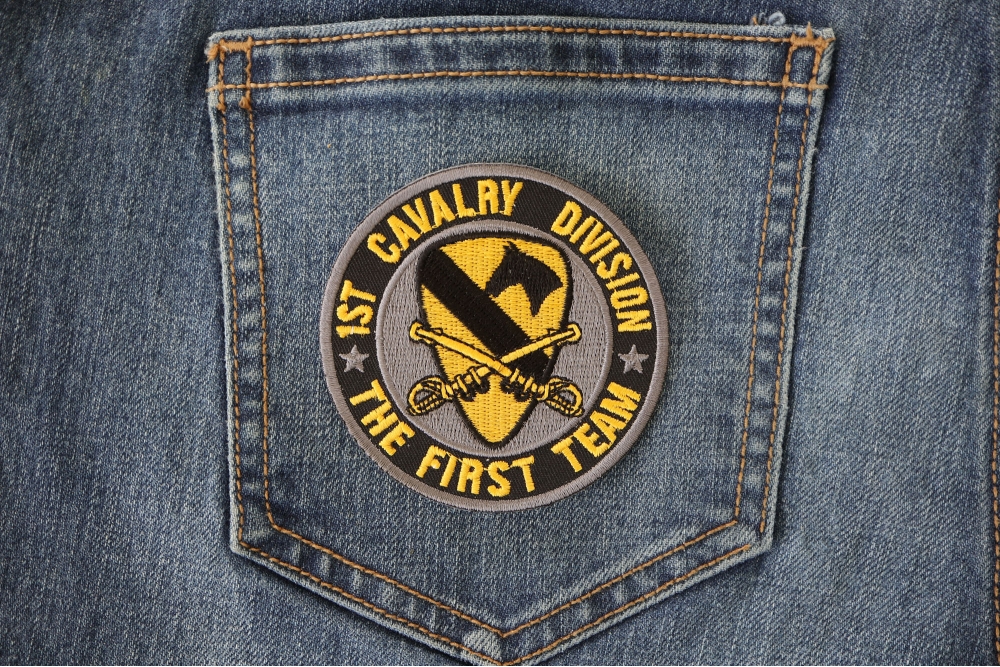 1st Cavalry Division Patch The First Team shown on jeans
