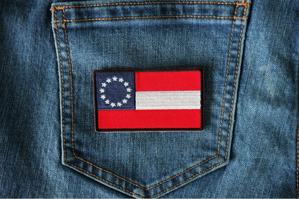 Historical Stars and Bars Flag Iron on Patch shown on jeans