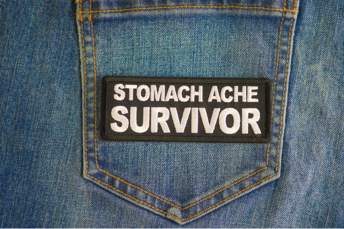 Stomach Ache Survivor Patch shown on jeans