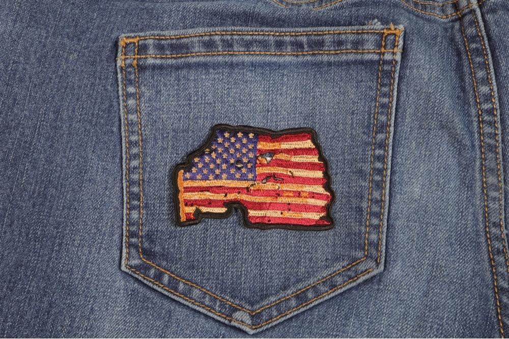 Vintage American Flag Patch shown on jeans