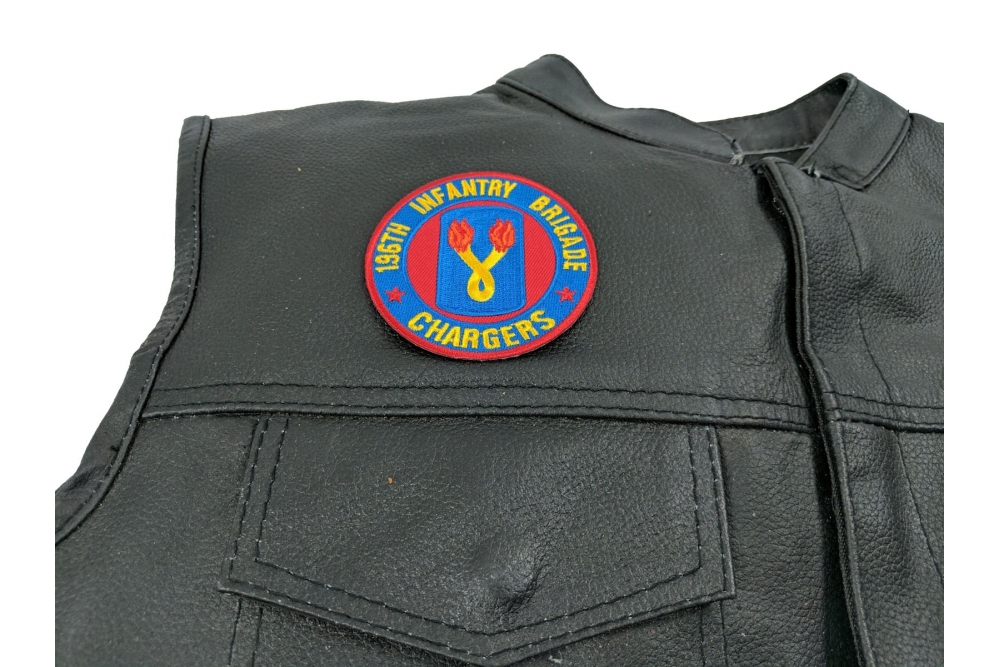 196th Infantry Brigade Patch Chargers - 3x3 inch. Embroidered Iron on Patch shown on leather vest