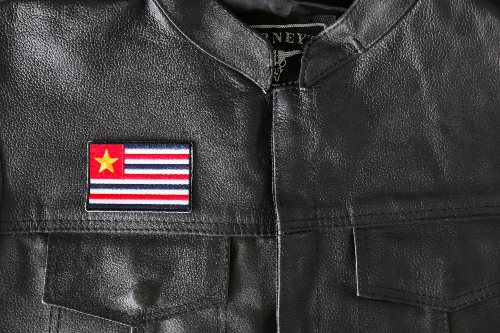 Historical Louisiana Flag Iron on Patch - 3x2 inch - Embroidered Iron on Patch shown on leather vest