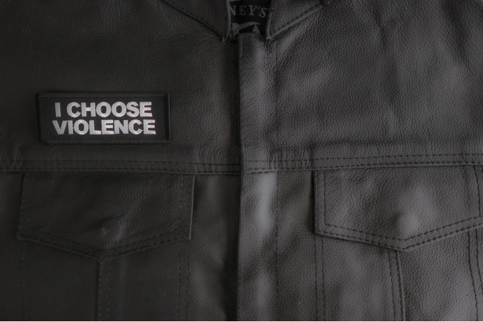 I Choose Violence Patch shown on leather vest