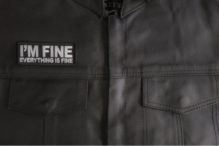 I'm Fine Everything Is Fine Patch shown on leather vest
