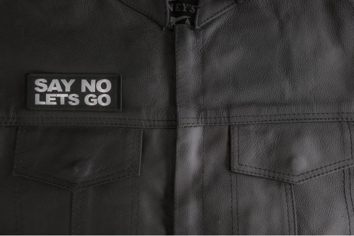 Say No Lets Go Patch shown on leather vest
