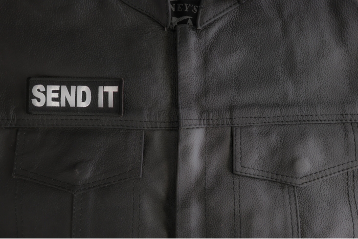 Send It Patch shown on leather vest