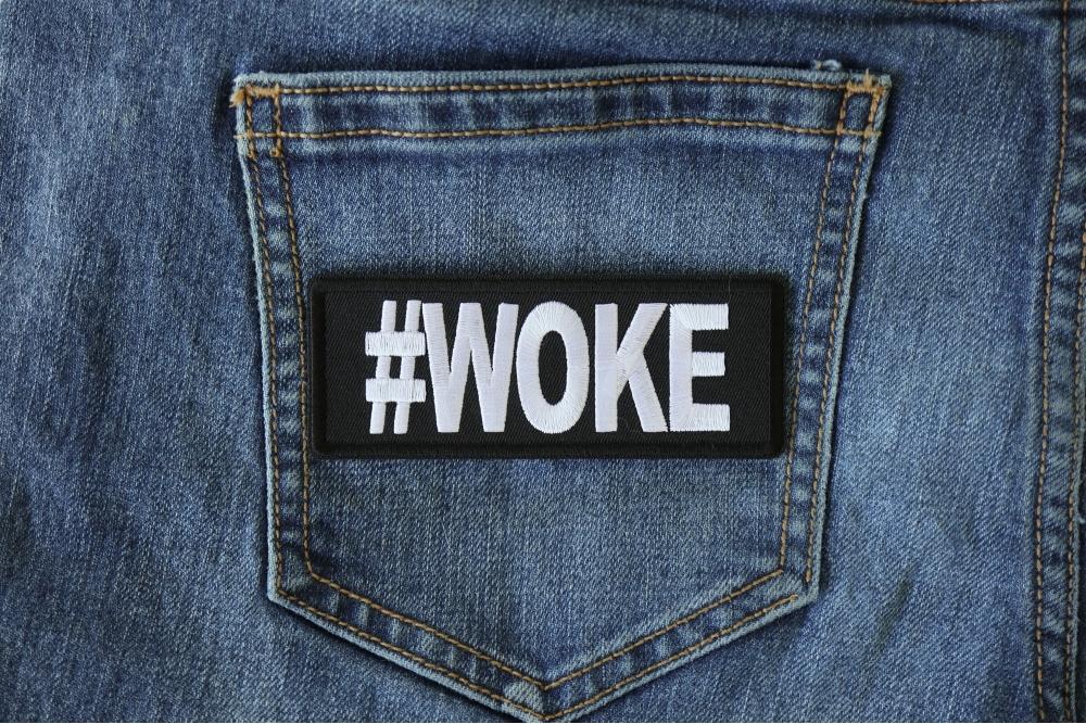 Hashtag Woke Patch shown on jeans