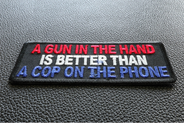 Gun In Hand Better is Better Than Cop On Phone Patch diagonal view