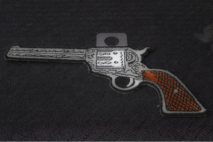 6 Shooter Pistol Patch Left Patch diagonal view