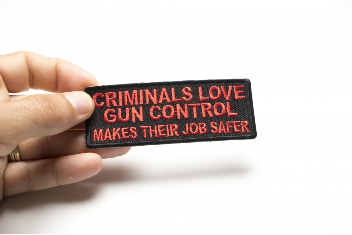 Criminals Love Gun Control Makes Their Job Safer Patch shown on hand for size comparison