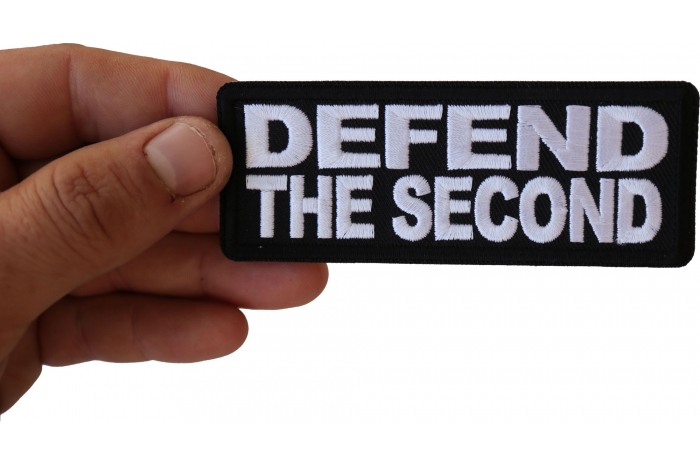 Defend the Second Patch shown on hand for size comparison