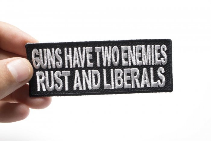 Guns Have Two Enemies Rust and Liberals Patch shown on hand for size comparison