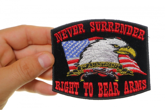 Never Surrender Right To Bear Arms 2nd Amendment Black Patch shown on hand for size comparison