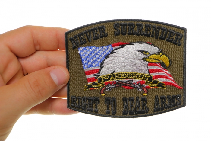 Never Surrender Right To Bear Arms 2nd Amendment Iron on Patch shown on hand for size comparison
