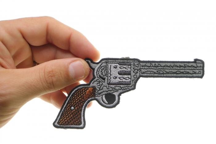 6 Shooter Pistol Gun Patch Right shown on hand for size comparison