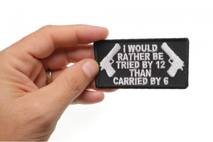 I Would Rather Be Tried By 12 Than Carried By 6 Patch shown on hand for size comparison