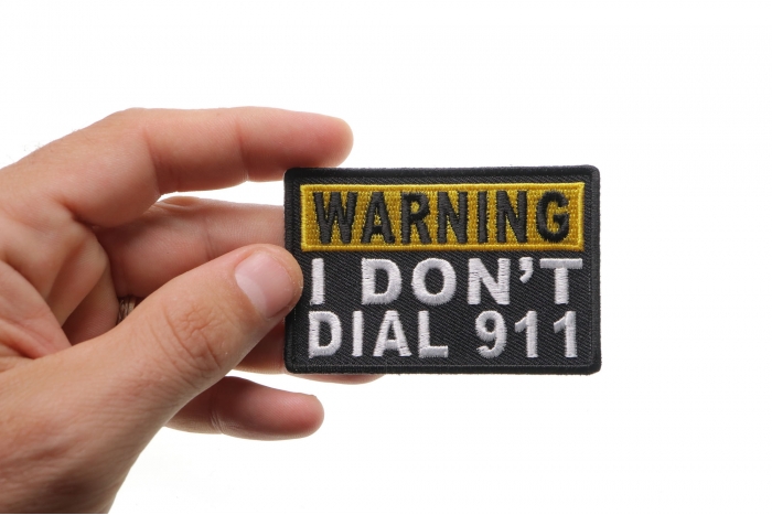 Warning I Don't Dial 911 Patch shown on hand for size comparison