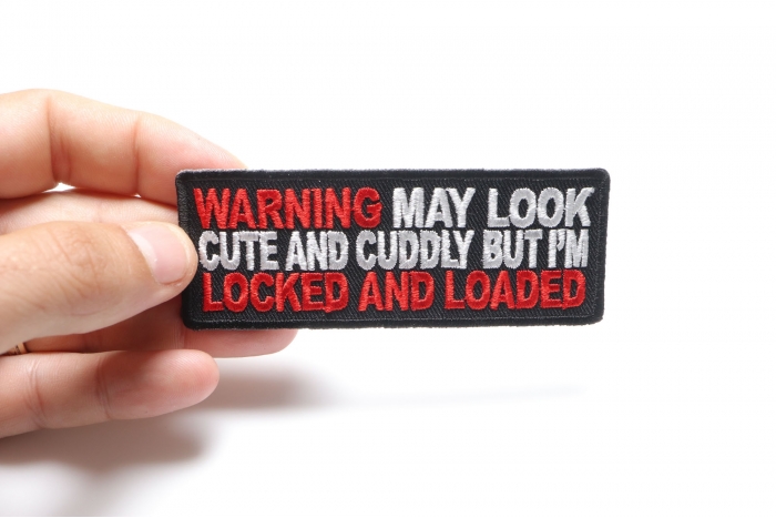 Warning May Look Cute and Cuddle But I'm Locked and Loaded Patch shown on hand for size comparison