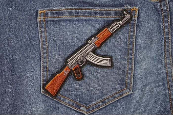 AK 47 Patch Right Assault Rifle Gun shown on jeans