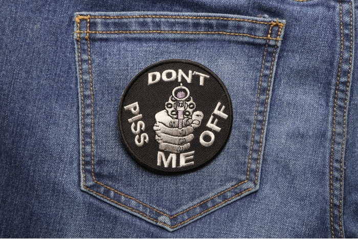 Do Not Piss Me Off With A Gun Patch shown on jeans