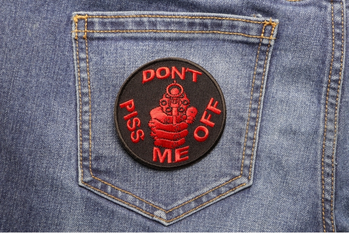 Don't Piss Me Off Gun Patch In Red shown on jeans