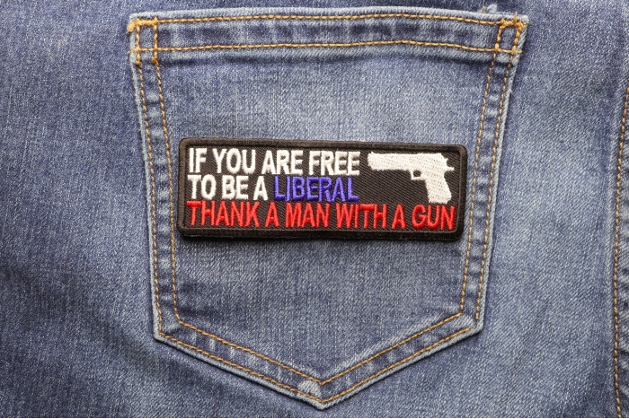 If You Are Free To Be Liberal Thank A Man With A Gun Patch shown on jeans