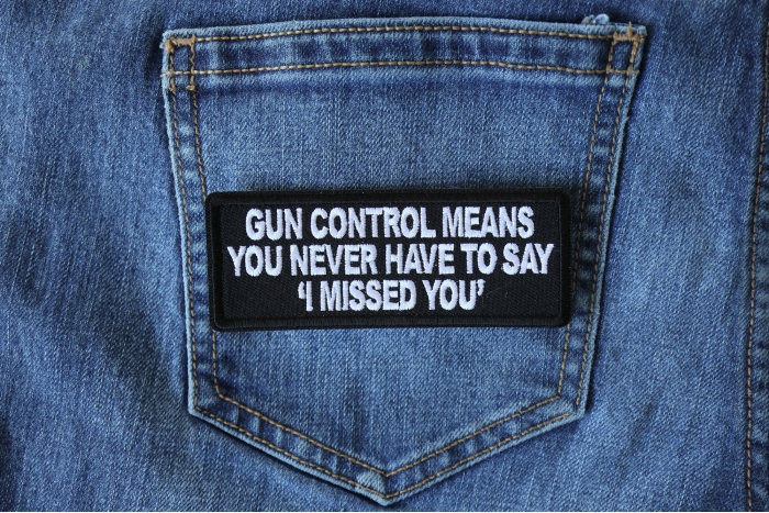 Gun Control Means you never Have to Say I Missed Funny Iron on Patch shown on jeans