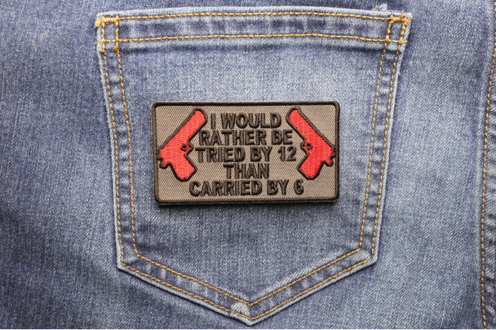 I Would Rather Be Tried By 12 Than Carried By 6 Patch shown on jeans