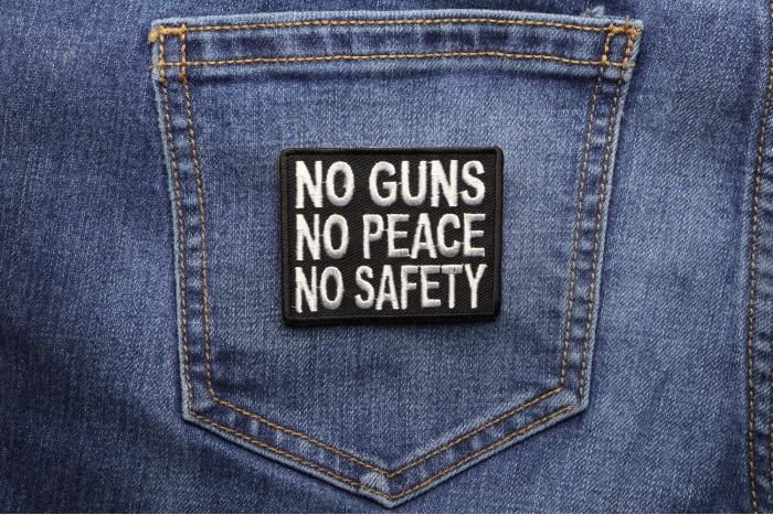No Guns No Peace No Safety Patch shown on jeans