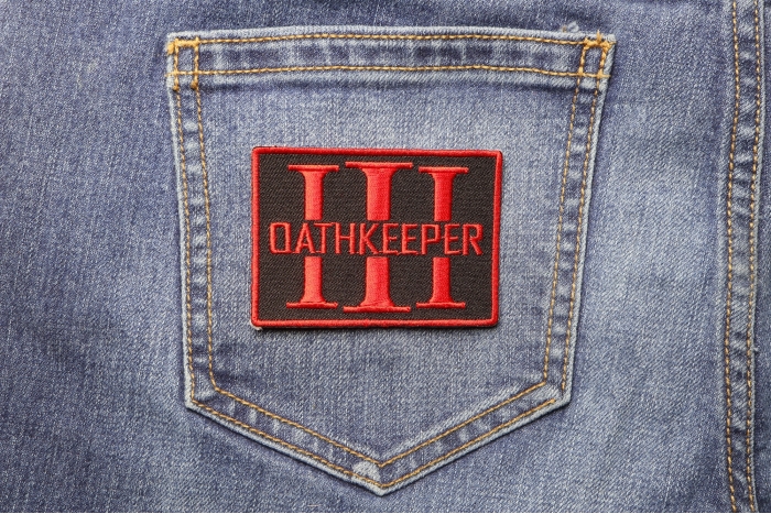 Oathkeeper Patch shown on jeans